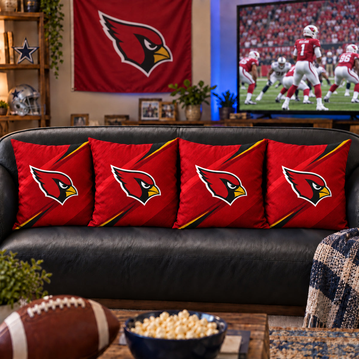 Four matching Arizona Cardinals throw pillows styled on a living room sofa