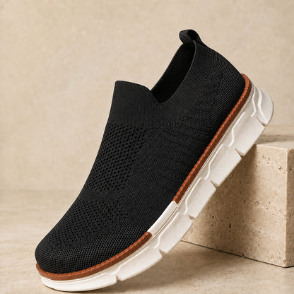 AirFlex black breathable knit slip-on shoe angled view