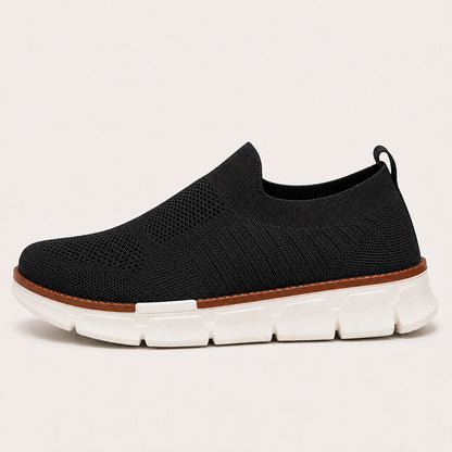 AirFlex black men's slip-on walking shoe side view on white background