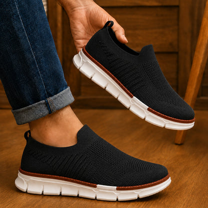 Man wearing AirFlex black slip-on walking shoes
