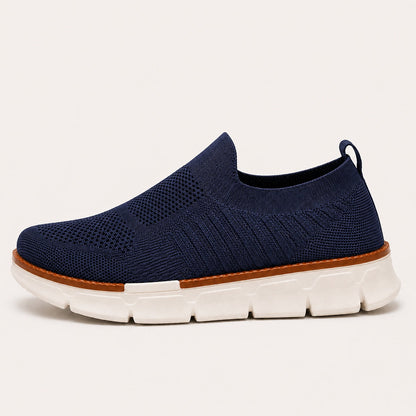 AirFlex navy men's slip-on walking shoe side view on white background