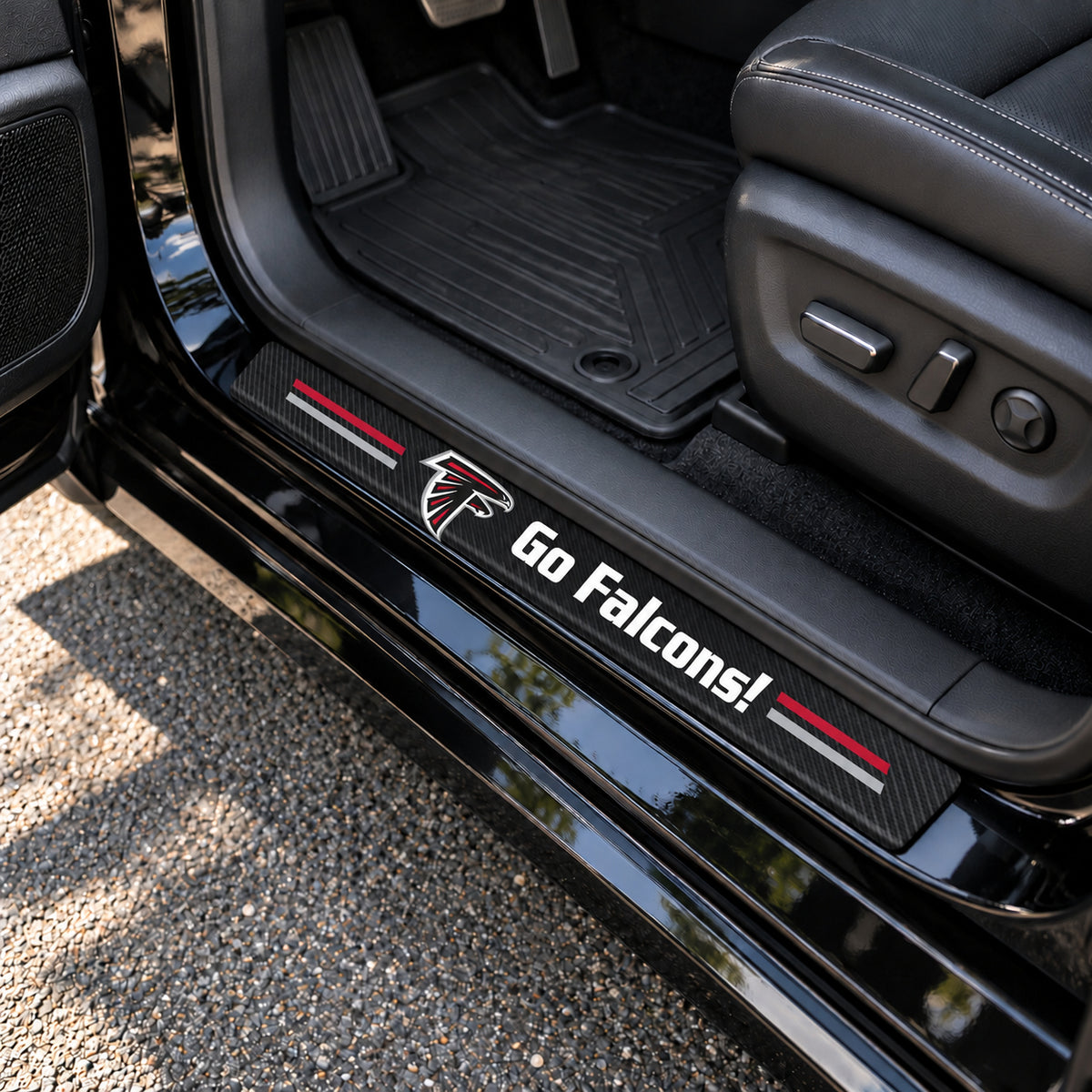 Atlanta Falcons carbon fiber texture car door sill protector strips installed on a black car