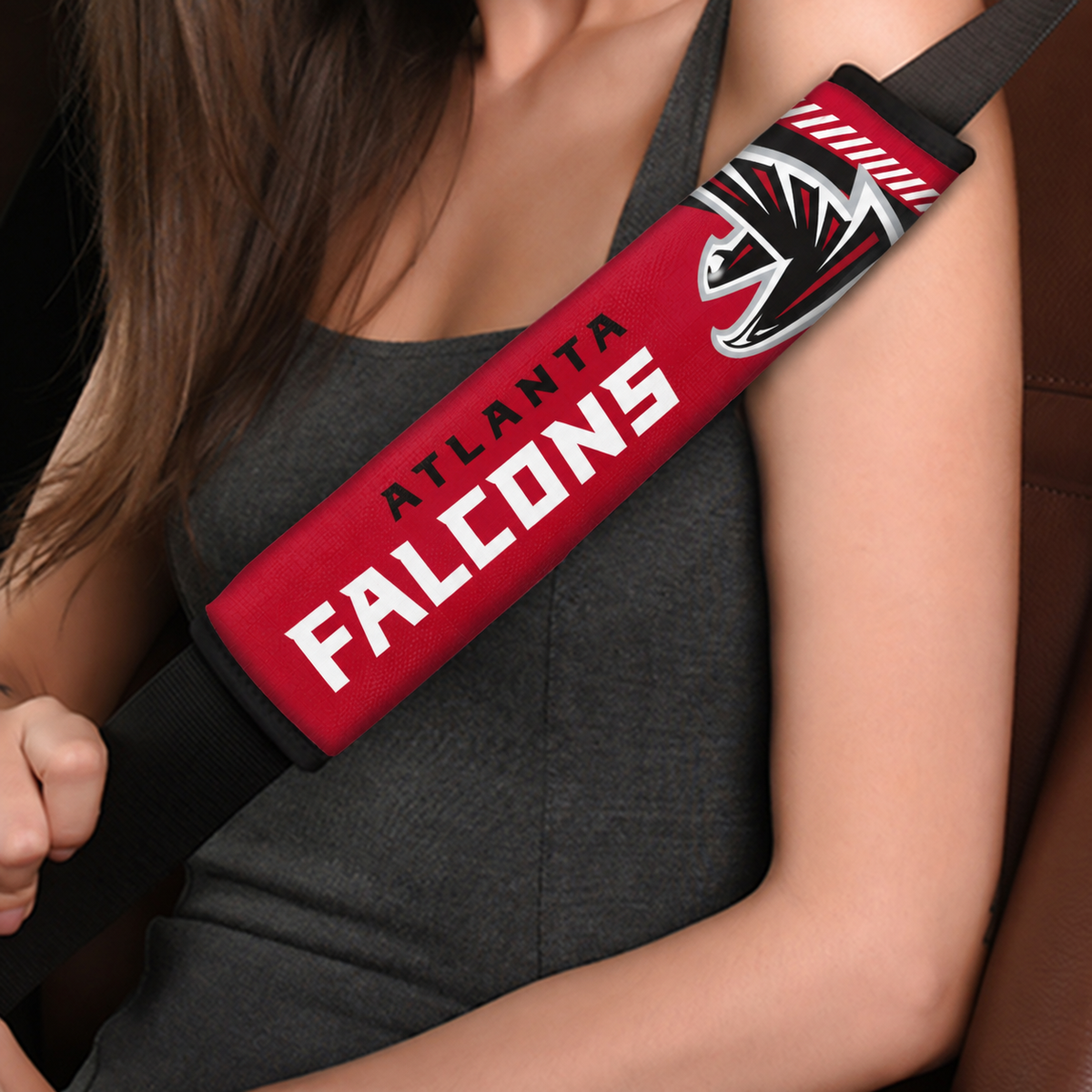 Close-up of Atlanta Falcons shoulder strap cover worn on a car seat belt