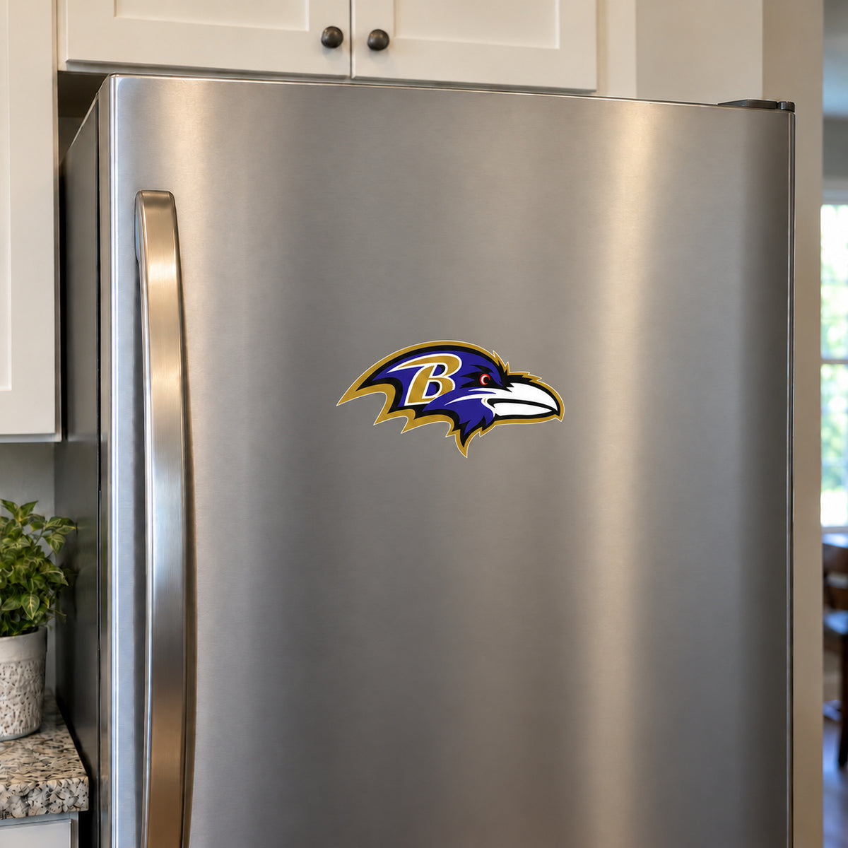 Baltimore Ravens decorative sticker displayed on a stainless-steel refrigerator