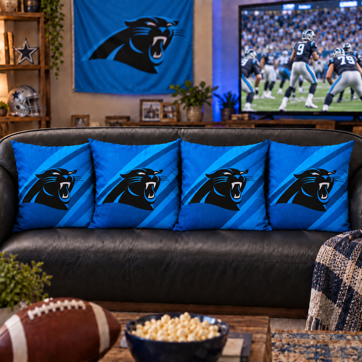 Matching Carolina Panthers sofa cushion covers shown in a living-room styling example