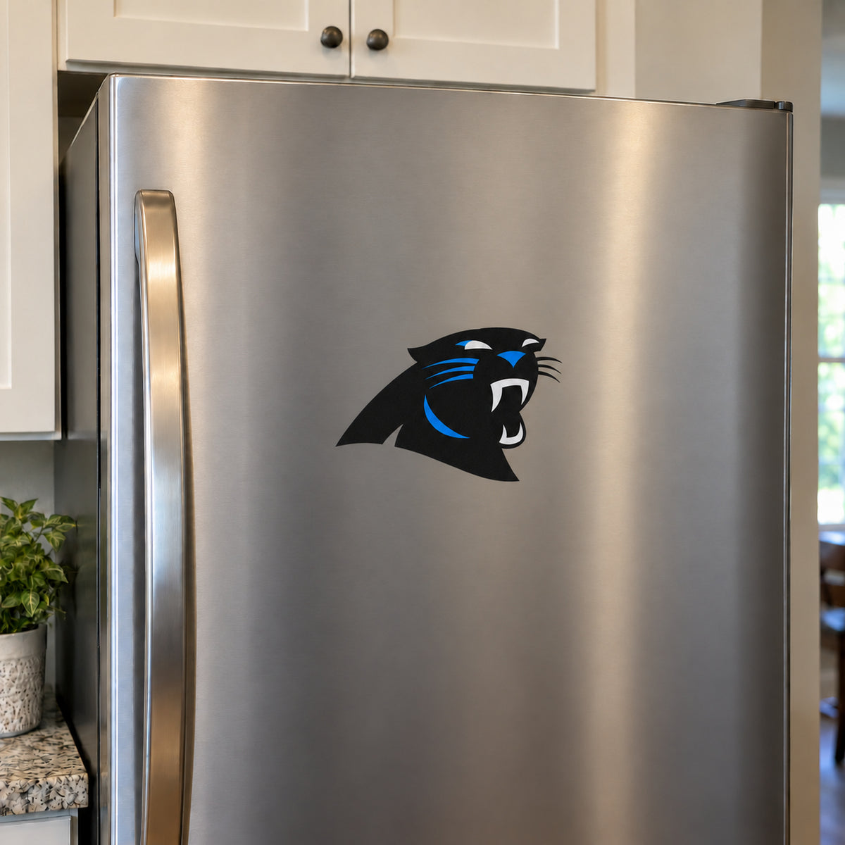 Carolina Panthers decorative sticker displayed on a stainless-steel refrigerator