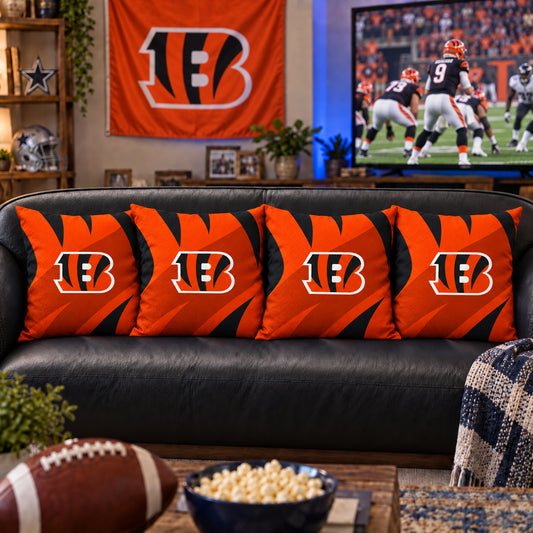 Matching Cincinnati Bengals sofa cushion covers shown in a living-room styling example