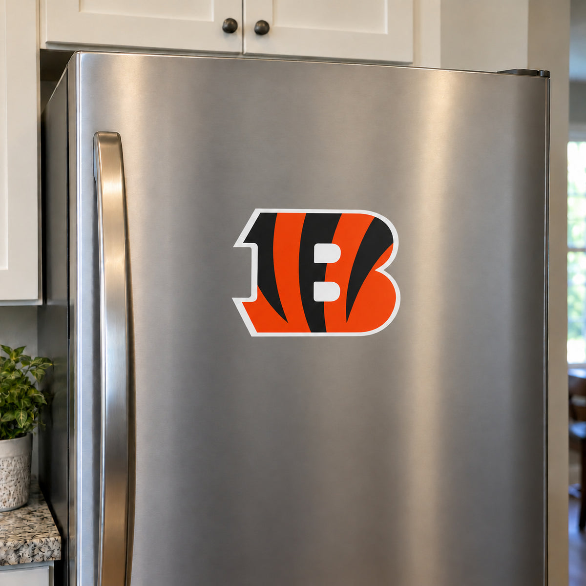 Cincinnati Bengals decorative sticker displayed on a stainless-steel refrigerator