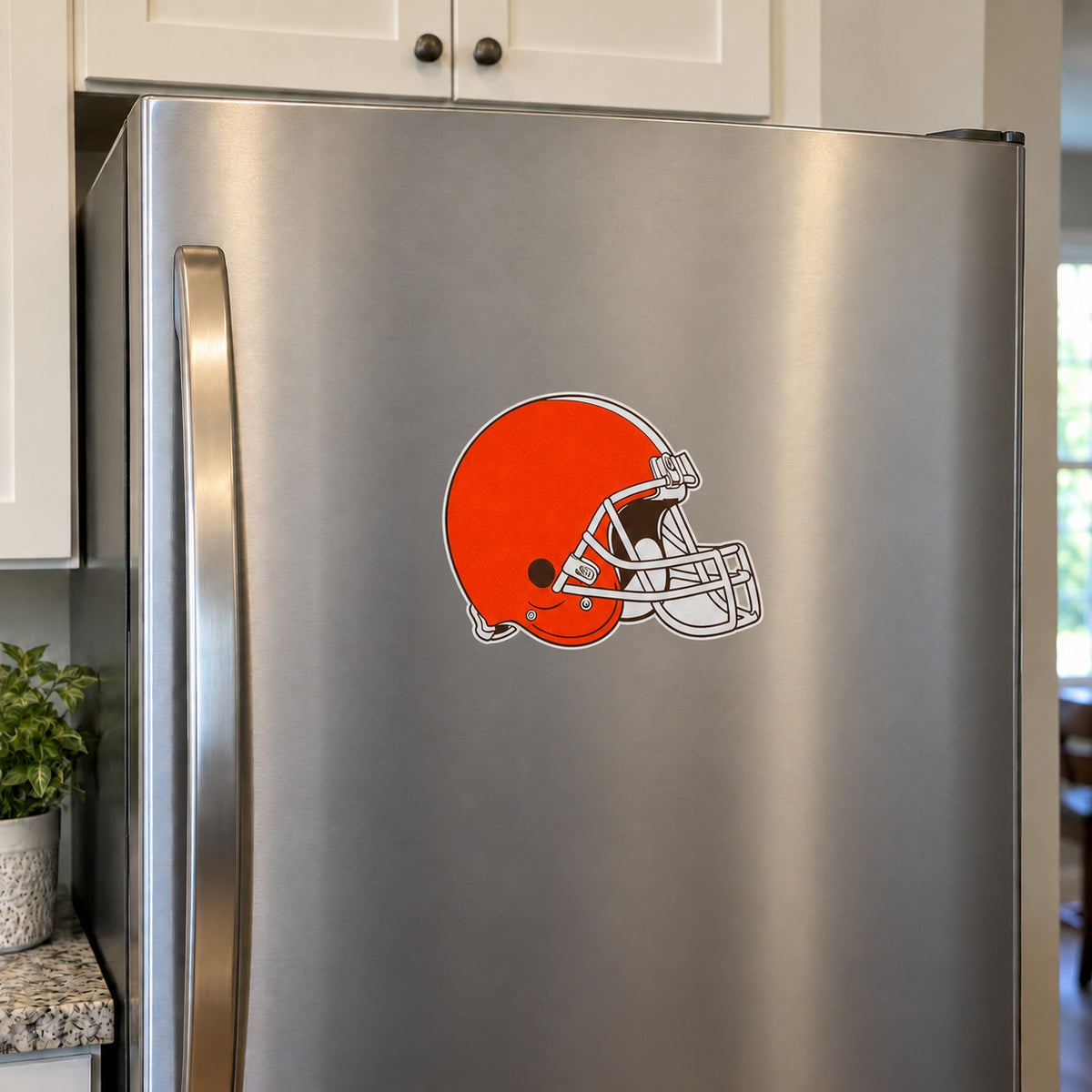 Cleveland Browns decorative sticker displayed on a stainless-steel refrigerator