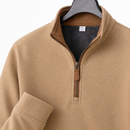 Close-up of Crest quarter-zip collar, zipper trim and waffle-knit texture in Khaki