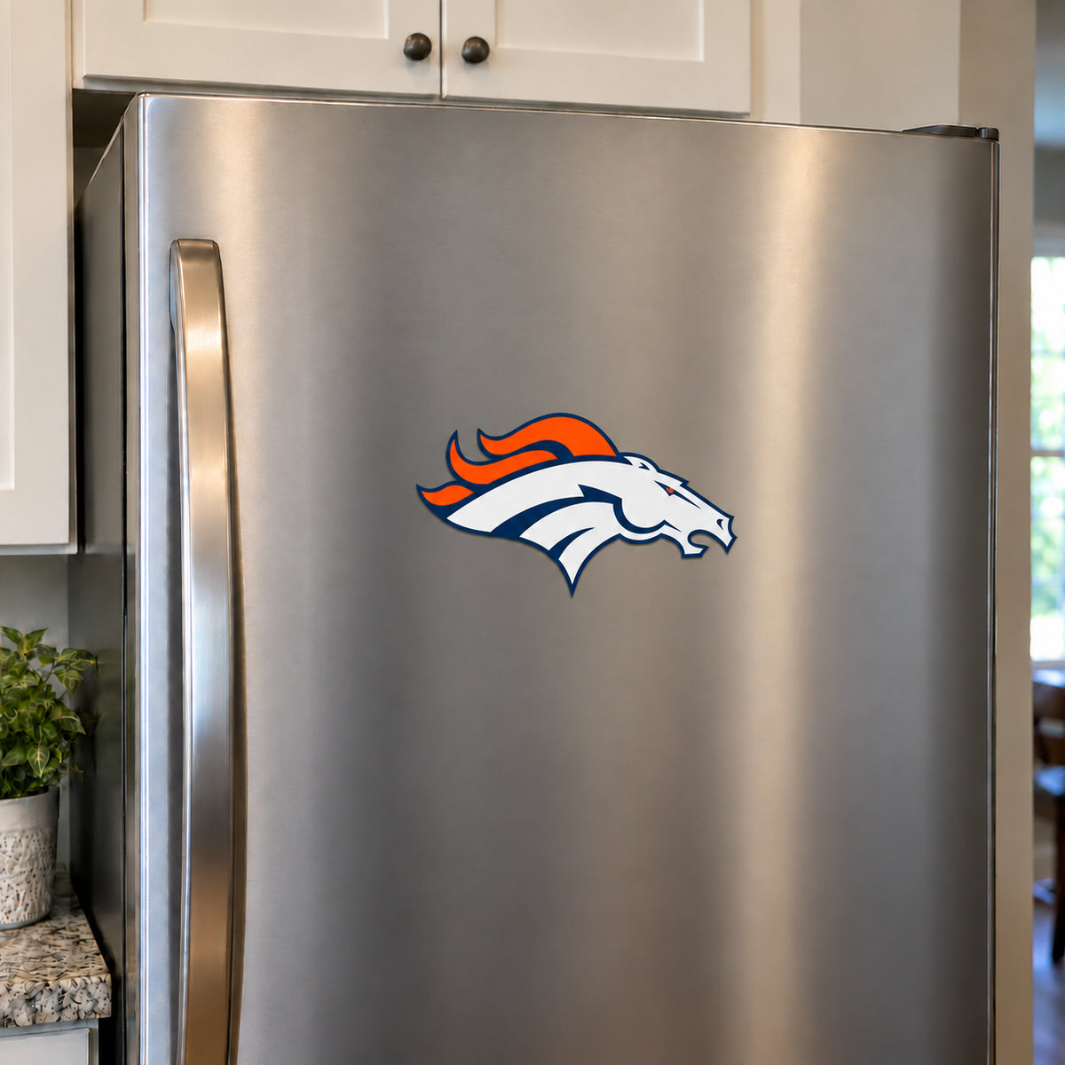 Denver Broncos decorative sticker displayed on a stainless-steel refrigerator