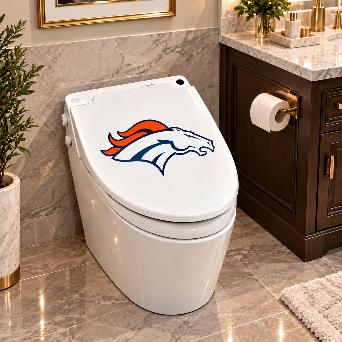 Denver Broncos decorative sticker on a closed white toilet lid in a marble bathroom