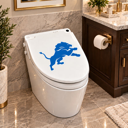 Detroit Lions decorative sticker on a closed white toilet lid in a marble bathroom