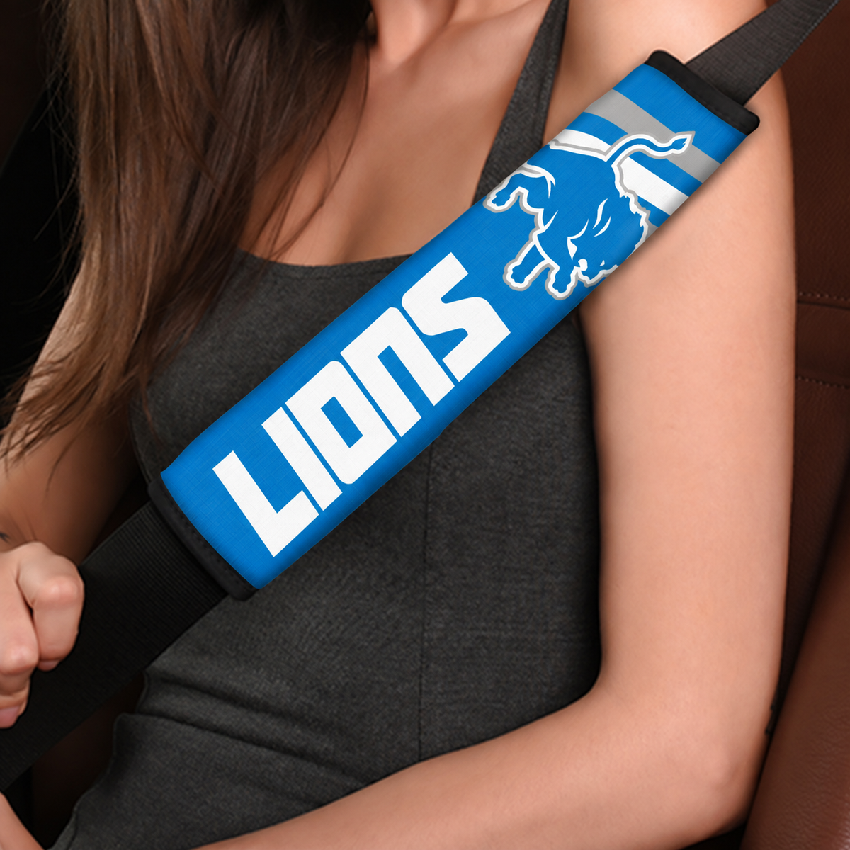 Close-up of Detroit Lions shoulder strap cover worn on a car seat belt