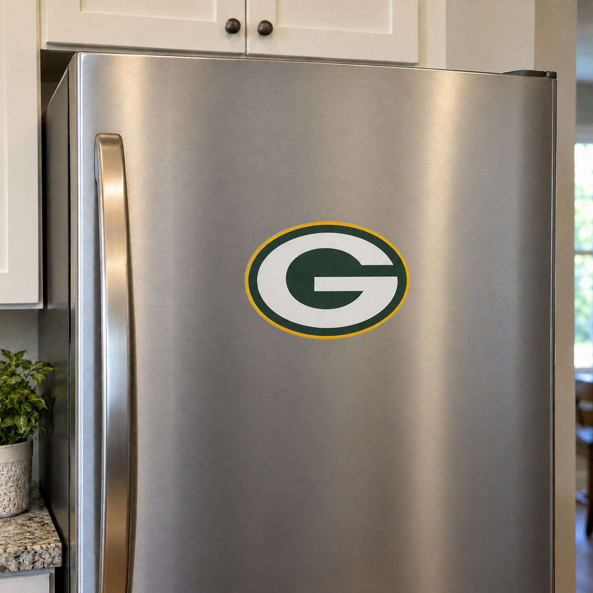 Green Bay Packers decorative sticker displayed on a stainless-steel refrigerator