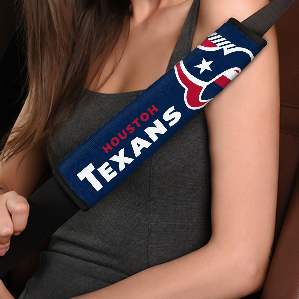 Close-up of Houston Texans shoulder strap cover worn on a car seat belt