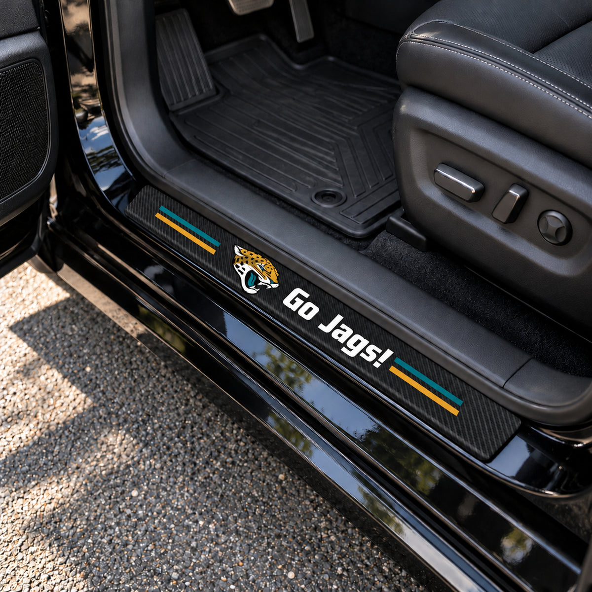Jacksonville Jaguars carbon fiber texture car door sill protector strips installed on a black car