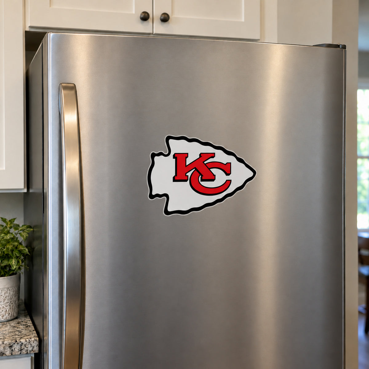 Kansas City Chiefs decorative sticker displayed on a stainless-steel refrigerator