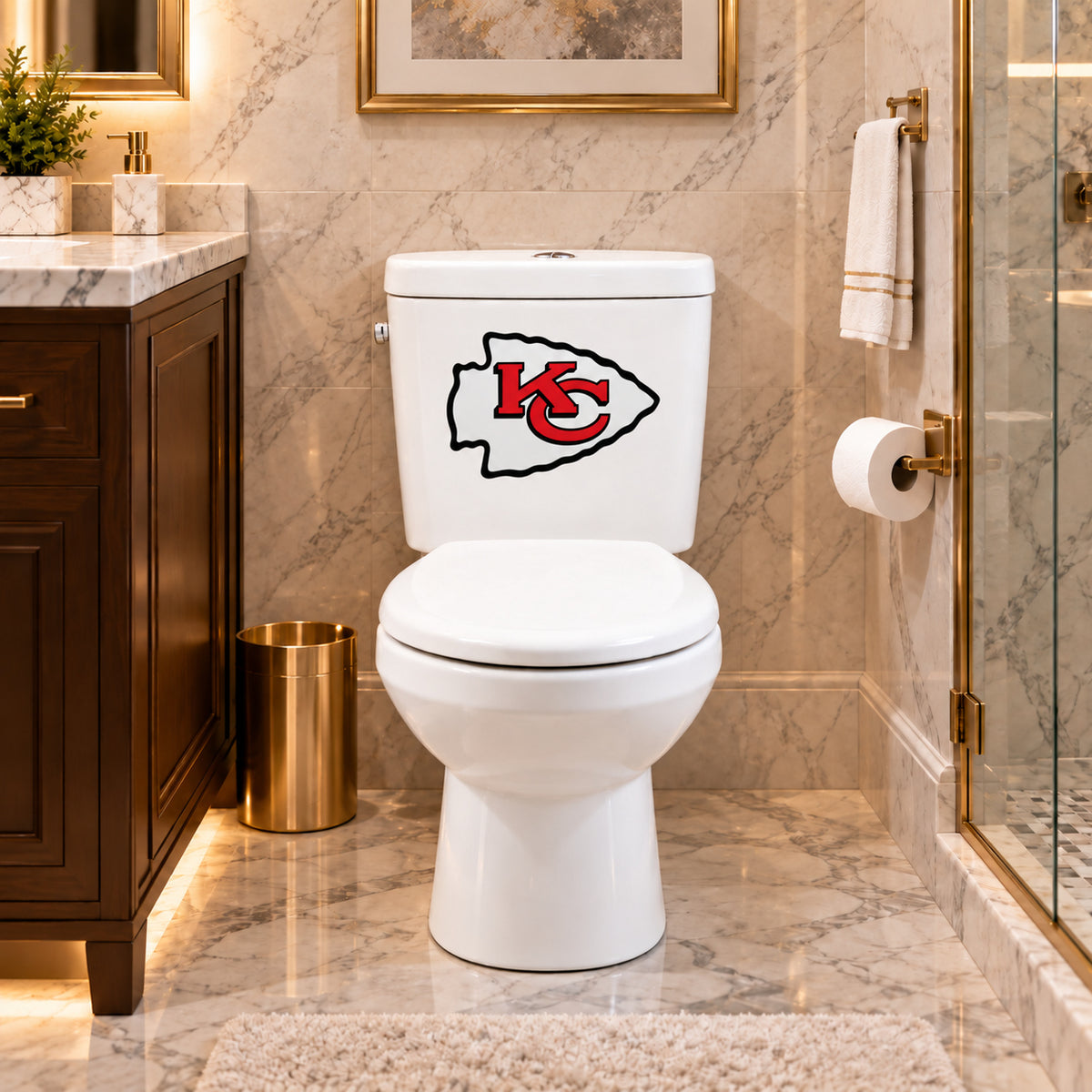 Kansas City Chiefs decorative sticker on a white toilet tank in a marble bathroom
