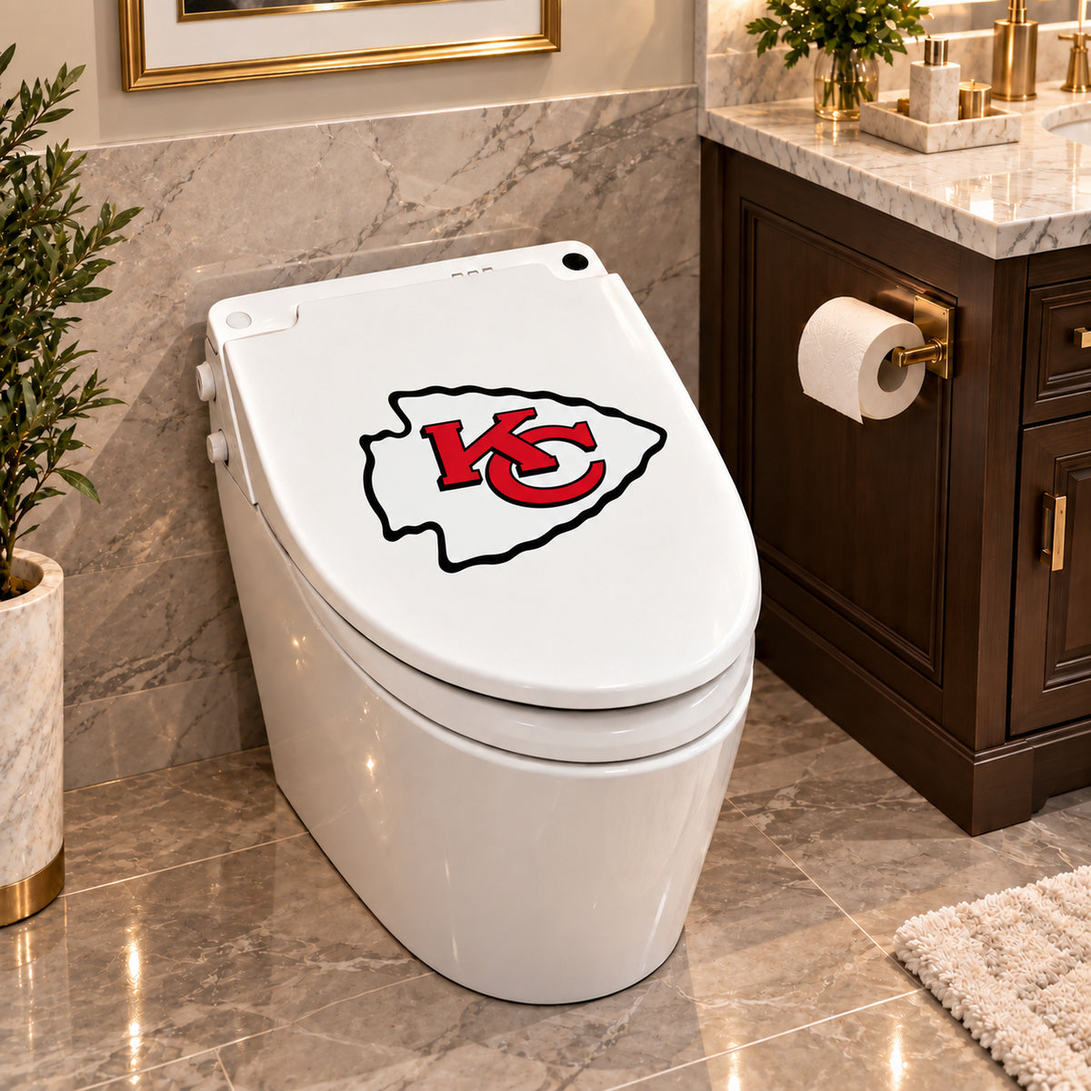 Kansas City Chiefs decorative sticker on a closed white toilet lid in a marble bathroom