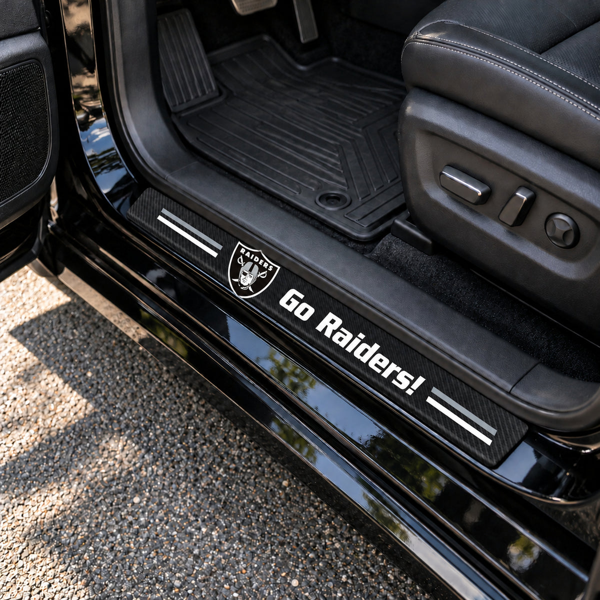 Las Vegas Raiders carbon fiber texture car door sill protector strips installed on a black car
