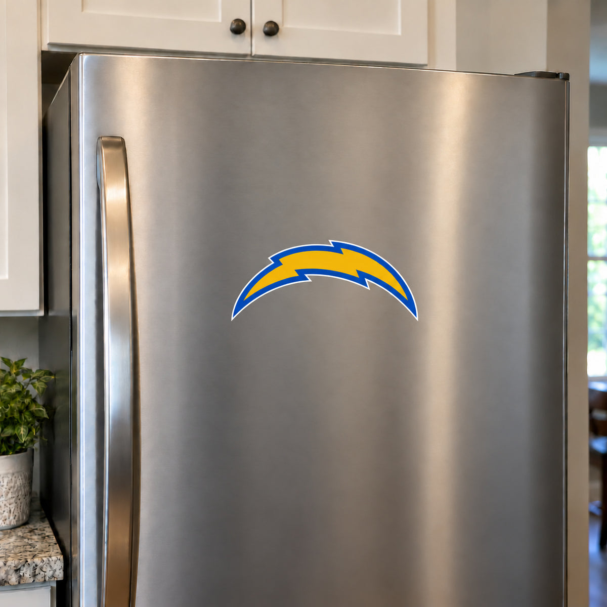 Los Angeles Chargers decorative sticker displayed on a stainless-steel refrigerator