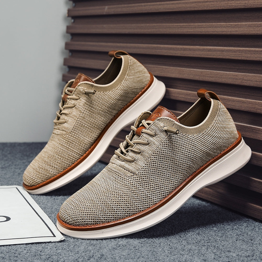Men's breathable knit dress sneakers, beige upper with white sole, angled pair view