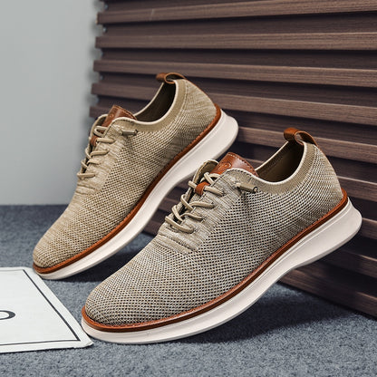 Men's breathable knit dress sneakers, beige upper with white sole, angled pair view