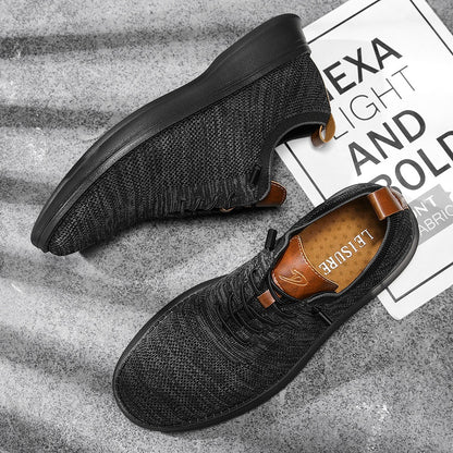 Men's breathable knit dress sneakers, black upper with black sole, top pair view