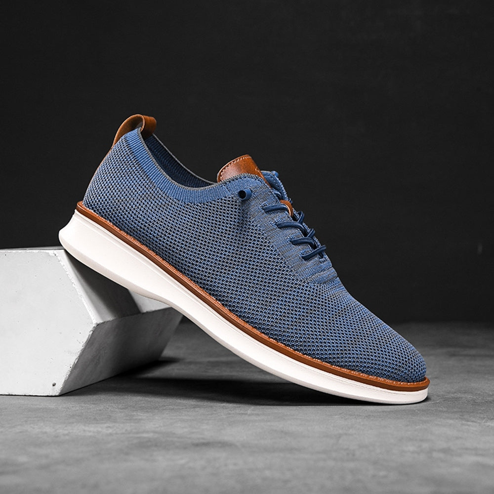 Men's breathable knit dress sneakers, blue upper with white sole, side view