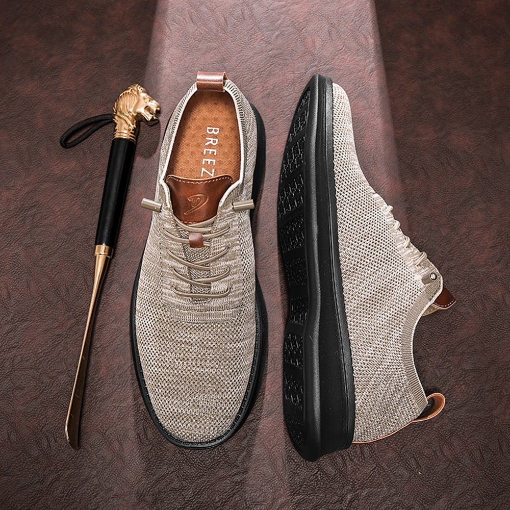 Men's breathable knit dress sneakers, cream upper with black sole, top and outsole view