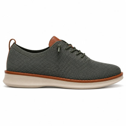 Men's breathable knit dress sneakers, green upper with beige sole, side view
