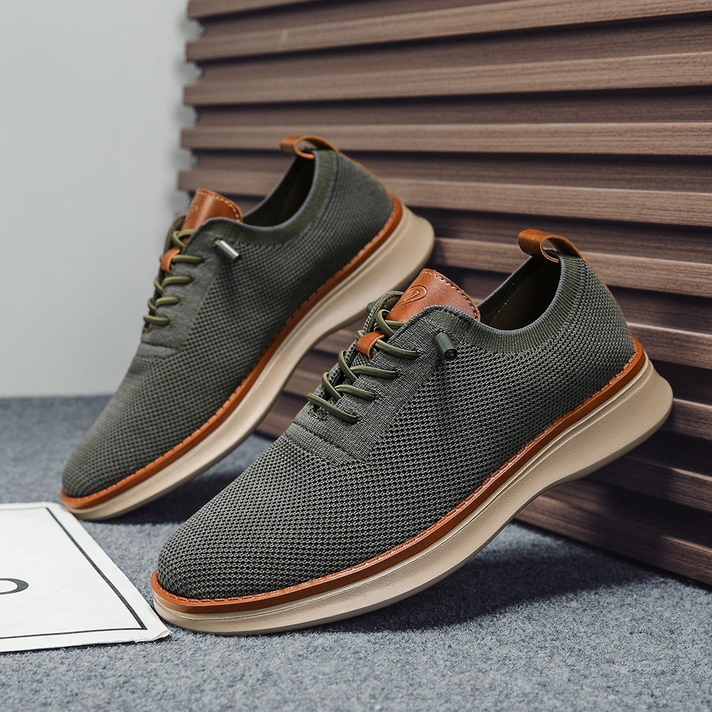 Men's breathable knit dress sneakers, green upper with beige sole, angled pair view