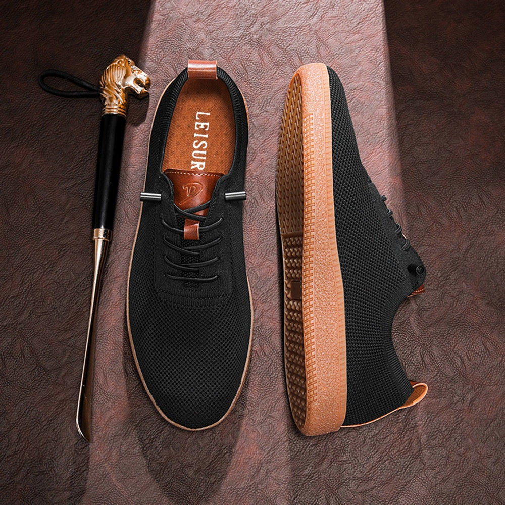 Men's black knit slip-on sneakers top and side views