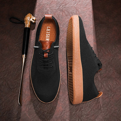 Men's black knit slip-on sneakers top and side views