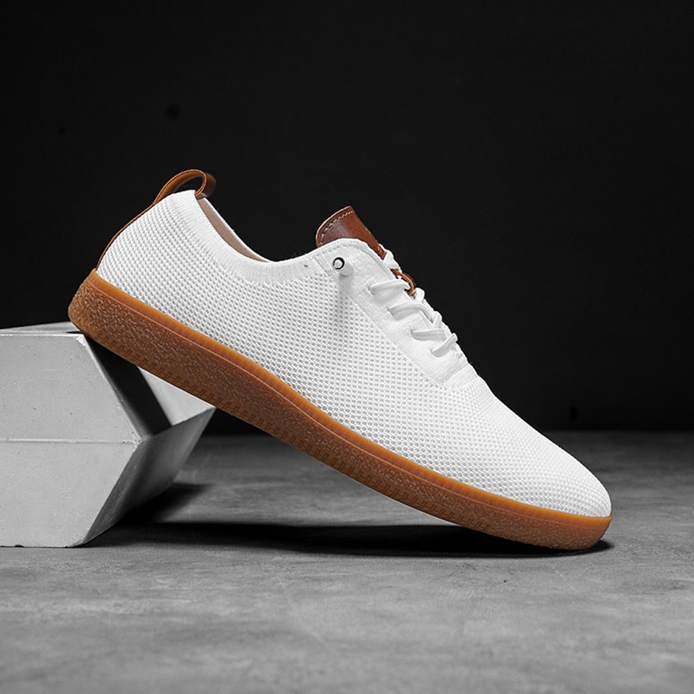 Men's white breathable knit slip-on gum-sole sneaker side view