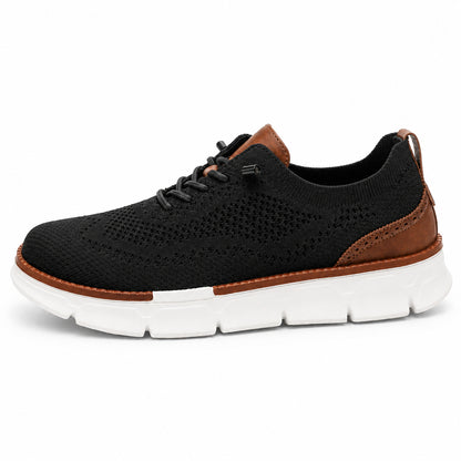 Black men's breathable stretch-knit slip-on walking shoe side view on white
