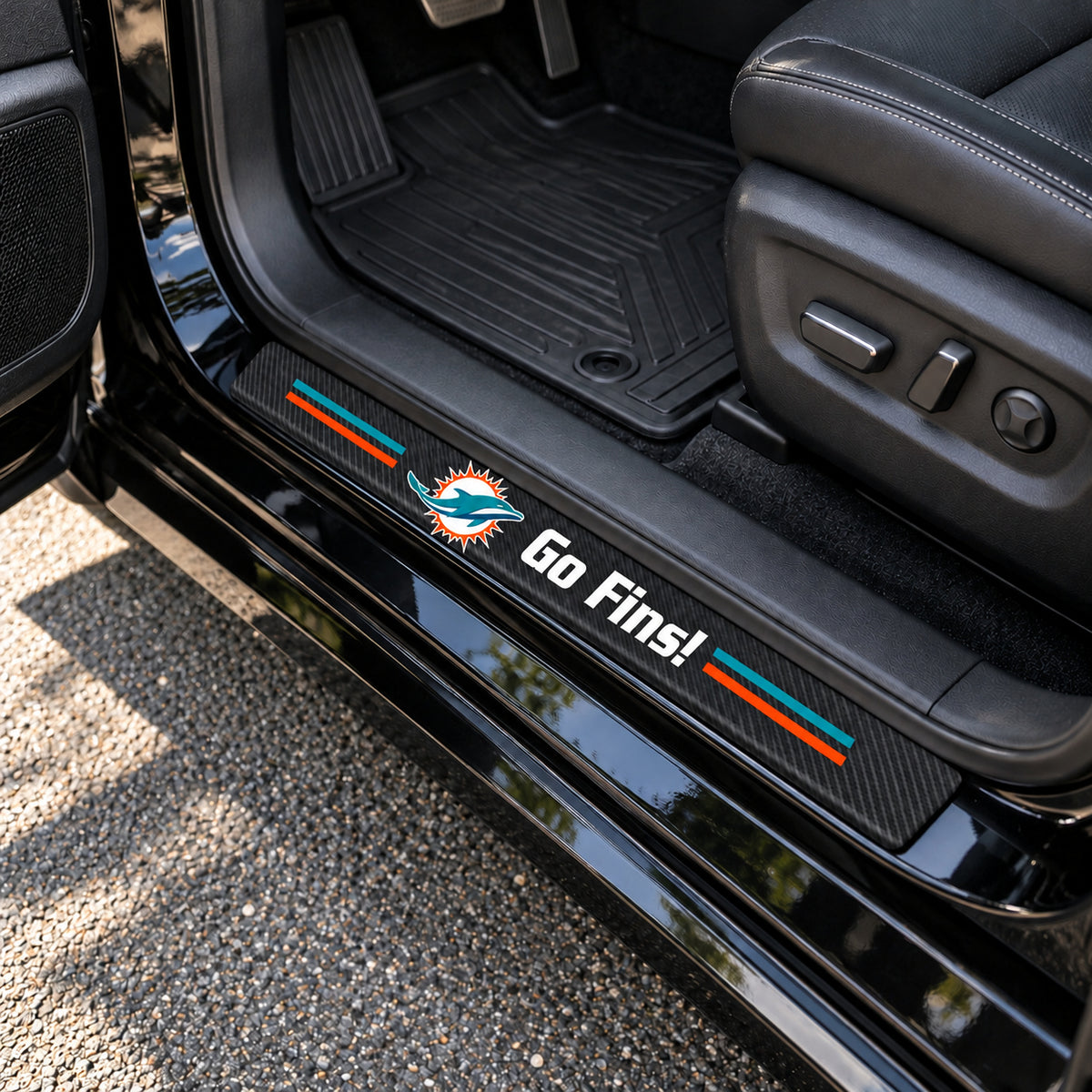 Miami Dolphins carbon fiber texture car door sill protector strips installed on a black car