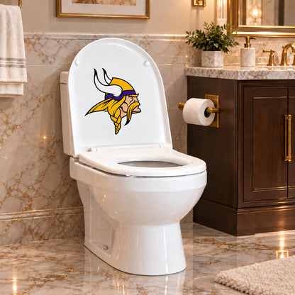 Minnesota Vikings decorative sticker on the inside of a white toilet lid in a marble bathroom
