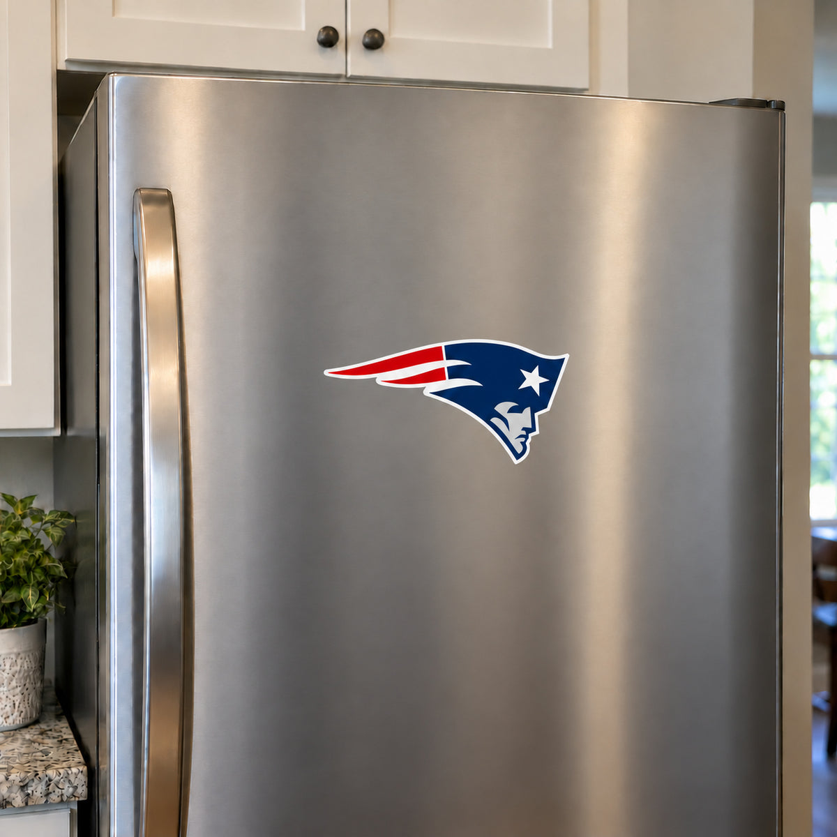 New England Patriots decorative sticker displayed on a stainless-steel refrigerator