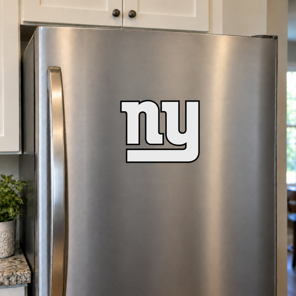 New York Giants decorative sticker displayed on a stainless-steel refrigerator