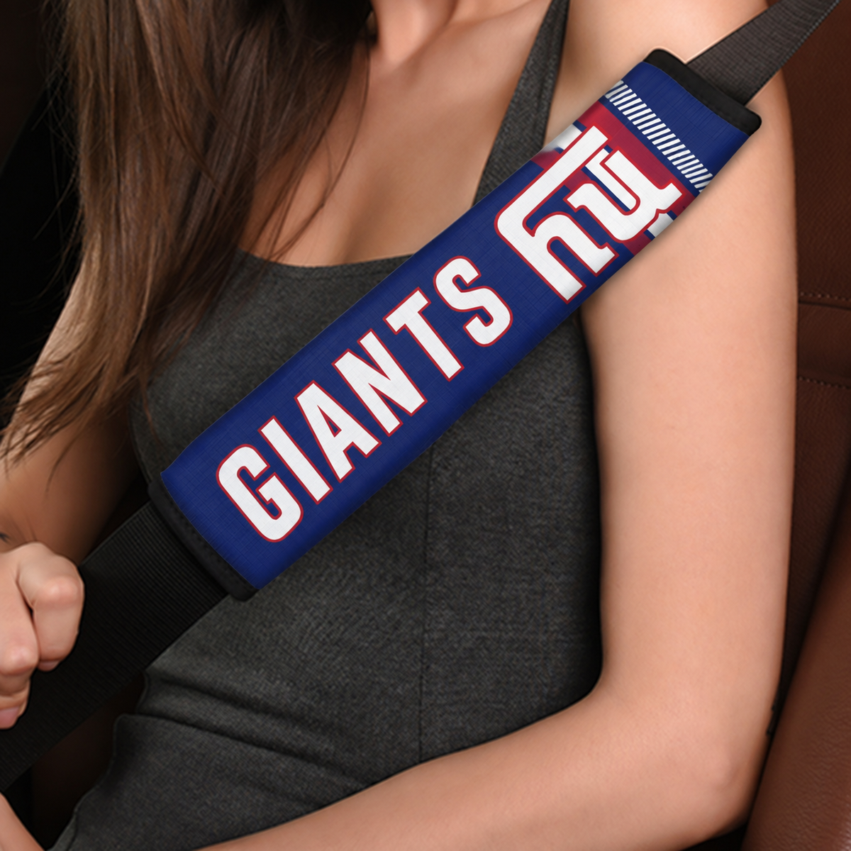 Close-up of New York Giants shoulder strap cover worn on a car seat belt
