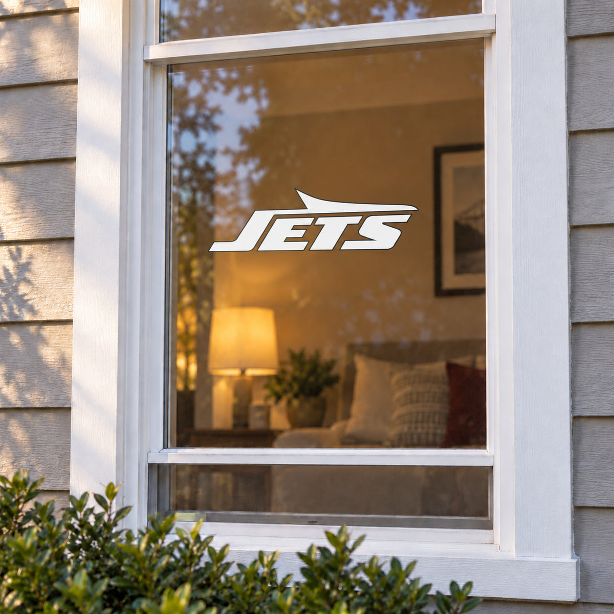 New York Jets decorative sticker displayed on a home window
