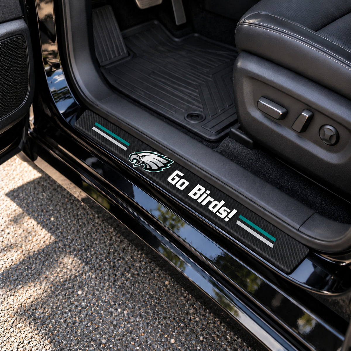 Philadelphia Eagles carbon fiber texture car door sill protector strips installed on a black car