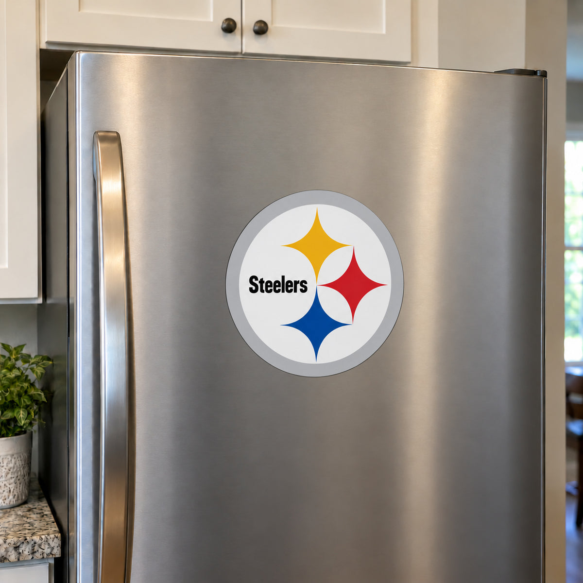 Pittsburgh Steelers decorative sticker displayed on a stainless-steel refrigerator