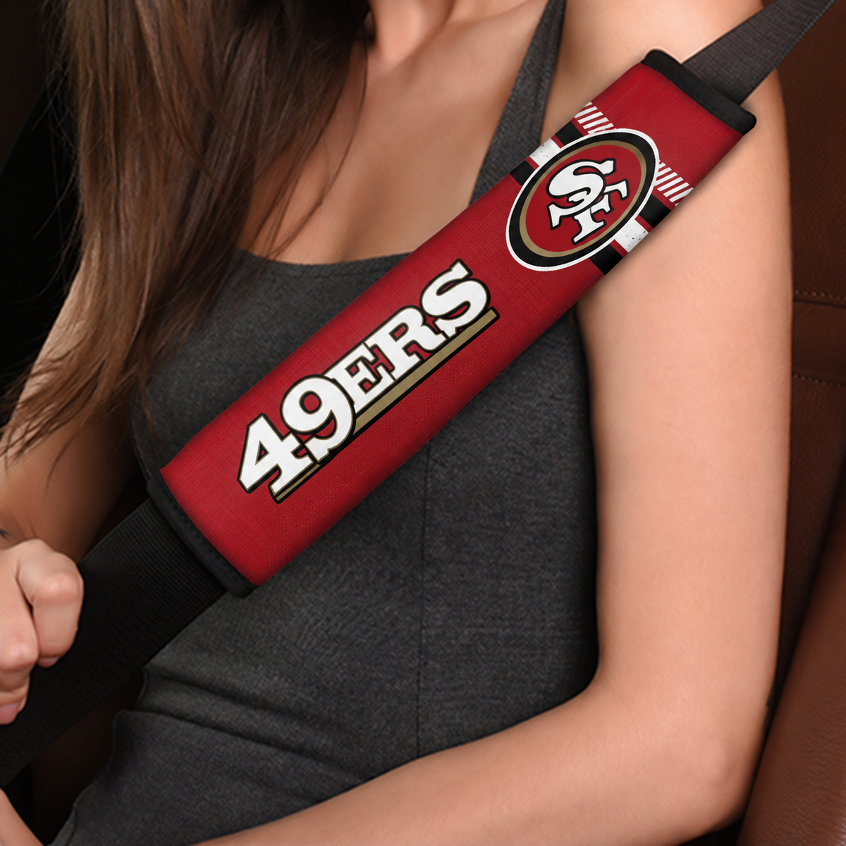 Close-up of San Francisco 49ers shoulder strap cover worn on a car seat belt