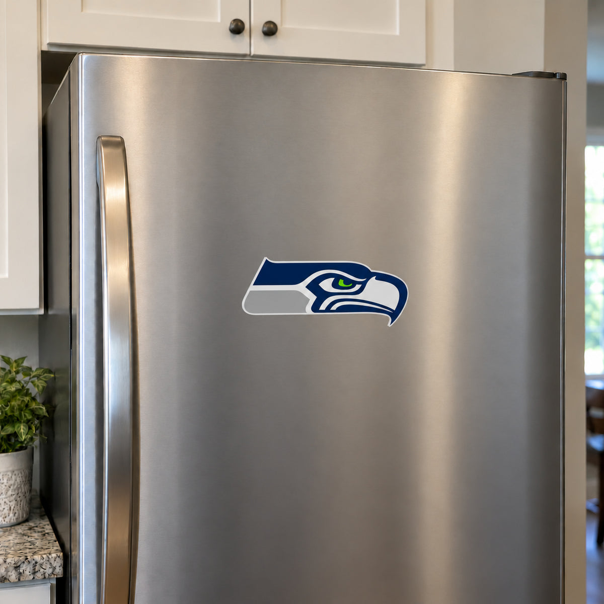 Seattle Seahawks decorative sticker displayed on a stainless-steel refrigerator