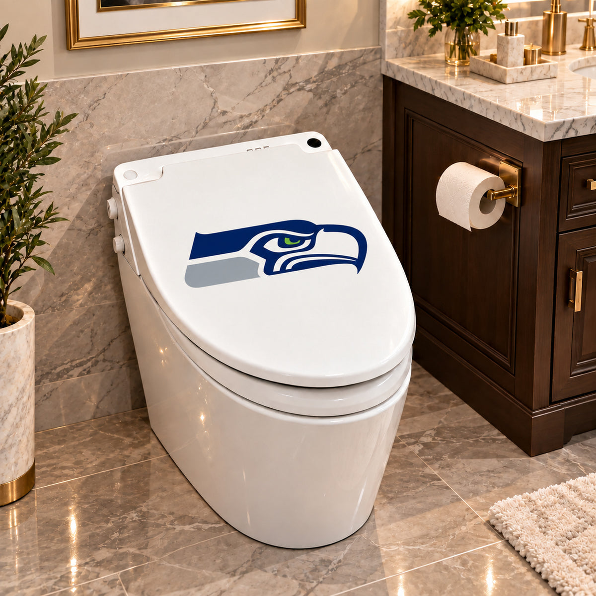 Seattle Seahawks decorative sticker on a closed white toilet lid in a marble bathroom