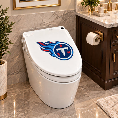 Tennessee Titans decorative sticker on a closed white toilet lid in a marble bathroom