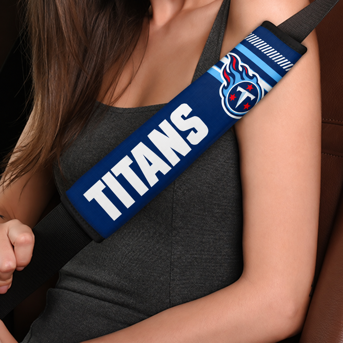 Close-up of Tennessee Titans shoulder strap cover worn on a car seat belt